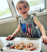 kid excited for donuts on a stick